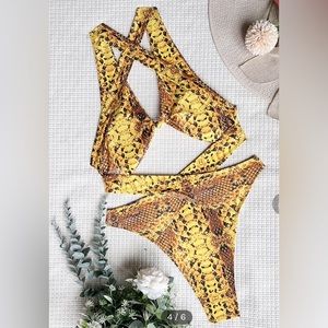 One piece bathing suit. New without tags. Size L